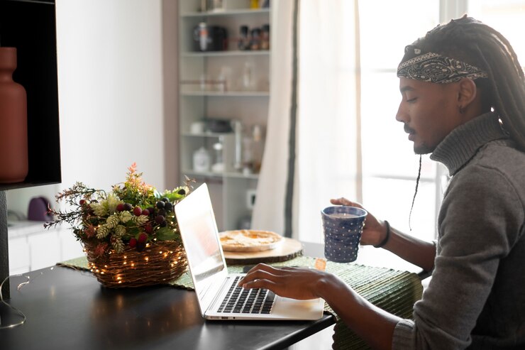 close-up-man-working-with-laptop_23-2149161008